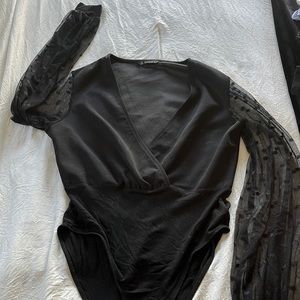 Black bodysuit with mesh sleeves